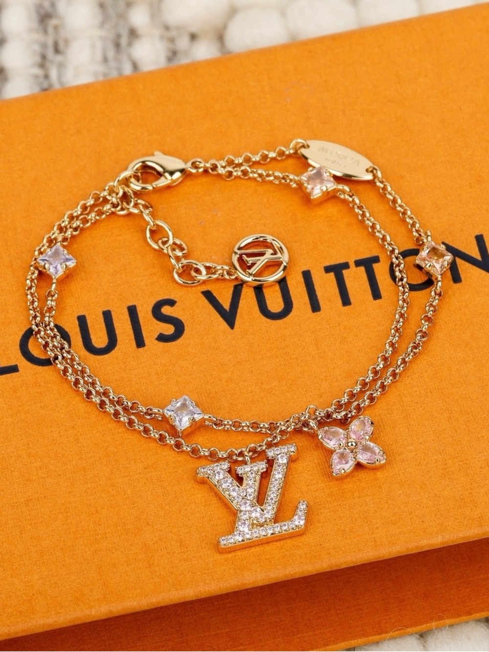 Louis Vuitton Gold Tone Bracelet with Pink and Clear Crystal Accents